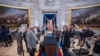 Organizers work to move the Inauguration Day swearing-in ceremony into the Capitol Rotunda due to expected frigid weather in Washington, Jan. 18, 2025. 