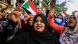 FILE - Sudanese women demonstrate in support of a civilian body to lead the transition to democracy, in Khartoum, April 12, 2019. Women say they were key forces in the Sudanese revolution and now deserve government leadership posts.