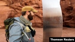 David Surber is seen after discovering the location of a metal monolith in Red Rock Desert, Utah, Nov. 27, 2020.