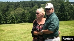 Nick and Bobbi Ercoline, the couple featured on the Woodstock album cover, pose together, at the site where the photo was taken 50 years ago, in Bethel, New York, June 12, 2019.