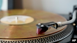 A vinyl record is seen at United Record Pressing, July 11, 2024, in Nashville, Tenn.