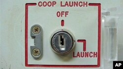 FILE - Launch key mechanism at the deactivated Delta Nine Launch Facility near Wall, South Dakota.