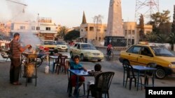 "Islomiy davlat" o'z poytaxti deb e'lon qilgan Raqqa shahri, 2014-yil