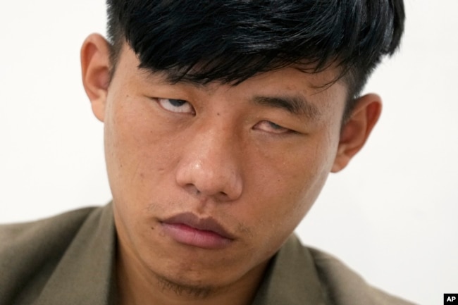 Takosangba Pongen, 27, a blind pianist, waits to perform at the two-day Brillante Piano Festival in Bengaluru, India, Sunday, Sept. 29, 2024. (AP Photo/Aijaz Rahi)