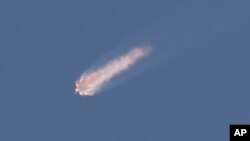 The SpaceX Falcon 9 rocket and Dragon spacecraft breaks apart shortly after liftoff at the Cape Canaveral Air Force Station in Cape Canaveral, Flaorida, June 28, 2015. 