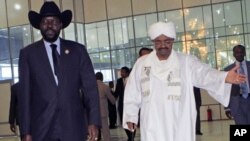 Sudan's President Omar al-Bashir welcomes his South Sudanese counterpart Salva Kiir for his first visit since southern secession to discuss key unresolved issues that have undermined north-south relations, during his arrival at Khartoum Airport, Sudan, Oc