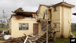 A house lies in ruins after Cyclone Yasi passed the northern Australian town of Tully, February 3, 2011.