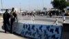 Car Bombs Strike Baghdad, Killing Army Recruits
