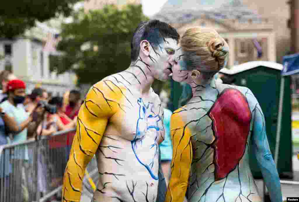 A couple participate in the annual NYC Bodypainting Day at Union Square in New York, July 25, 2021.