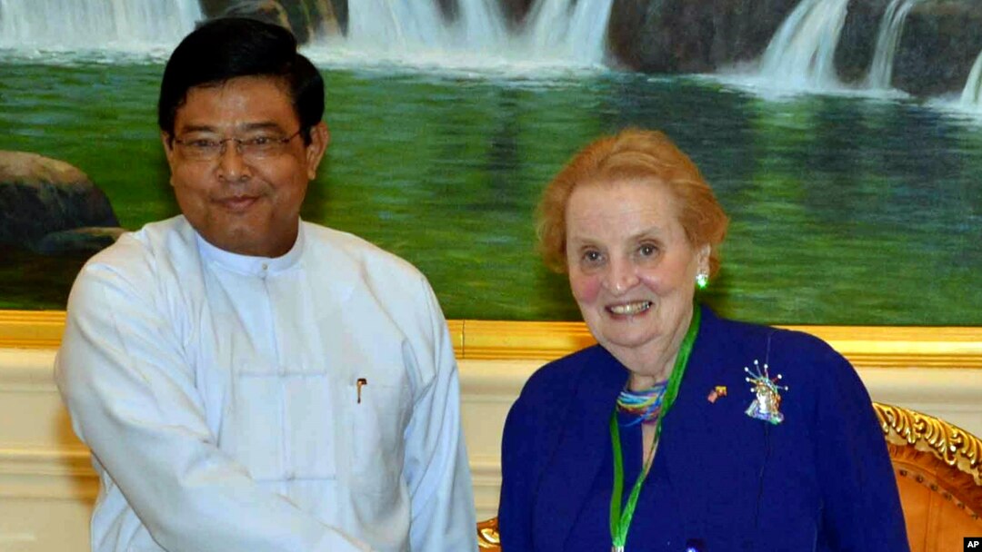Burma's Vice President Nyan Tun shakes hands with former U.S. Secretary of State Madeleine Albright during their meeting in Naypyitaw, Burma, June 3, 2013.