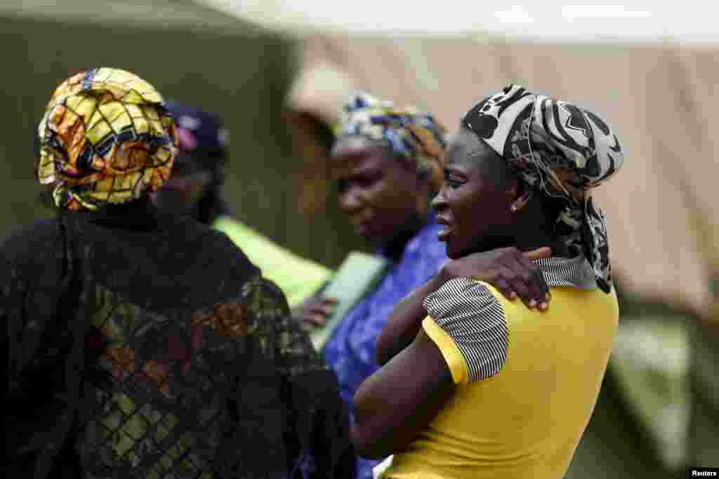 Women gather at the camp as more women and children rescued from Sambisa arrive, May 3, 2015.