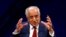 FILE - U.S. envoy for peace in Afghanistan Zalmay Khalilzad speaks during a debate at Tolo TV channel in Kabul, Afghanistan, April 28, 2019. 