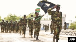 FILE - Somalian army special commando unit (Danab) marches during the 54th anniversary of the Somali National Army, held at the Army Headquarters in Mogadishu, April 12 2014. 