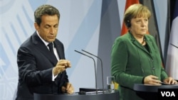 Presiden Perancis Nicolas Sarkozy dan Kanselir Jerman Angela Merkel belum mencapai kesepakatan bersama soal solusi utang Yunani.