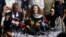 Ahed Tamimi speaks sitting between her father Bassam and mother Nariman during a press conference on the outskirts of the West Bank village of Nabi Saleh near the West Bank city of Ramallah, July 29, 2018. 