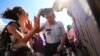 Demonstrators argue with police during a protest against a NATO summit in Brussels, Belgium, May 25, 2017. 