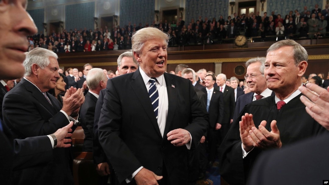 President Donald Trump arrives on Capitol Hill in Washington, Feb. 28, 2017, for his address to a joint session of Congress. 