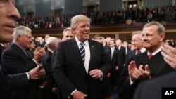 President Donald Trump arrives on Capitol Hill in Washington, Feb. 28, 2017, for his address to a joint session of Congress. 