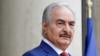 FILE - Khalifa Haftar, the military commander who dominates eastern Libya, arrives at an international conference on Libya at the Elysee Palace in Paris, May 29, 2018. 