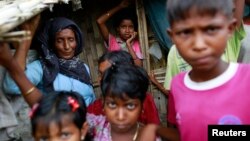 FILE - Rohingya Muslims are seen in Bawdupa IDP camp outside of Sittwe.