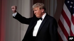 President-elect Donald Trump gestures after speaking during an America First Policy Institute gala at his Mar-a-Lago estate, Nov. 14, 2024, in Palm Beach, Florida.