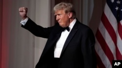 FILE - President-elect Donald Trump gestures after speaking during an America First Policy Institute gala at his Mar-a-Lago estate, Nov. 14, 2024, in Palm Beach, Florida.