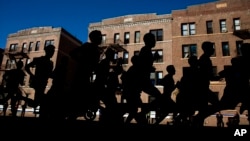 Runners move along 4th Avenue in the Brooklyn borough of New York during the New York City Marathon, Nov. 6, 2016. A study in Norway reports that having good health, like these runners, and worrying about it can lead to heart trouble.