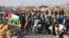 Displaced Gazans cross the Netzarim corridor from the southern Gaza Strip into Gaza City on Jan. 27, 2025.