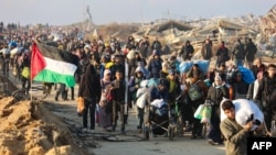 Displaced Gazans cross the Netzarim corridor from the southern Gaza Strip into Gaza City on Jan. 27, 2025.