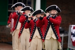 A fife and drums corps plays at a Memorial Day ceremony at Fort McHenry National Monument and Historic Shrine, in Baltimore, Maryland, May 25, 2020.