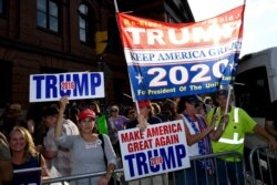 Supporters of President Donald Trump gather near the U.S. House Republican Member Retreat in Baltimore, Sept. 12, 2019.