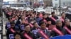 Doctors march toward the presidential office during a rally against the government's medical policy in Seoul, South Korea, Feb. 25, 2024. 