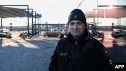 Captain Jussi Vainikka poses at the border station of the Nuijamaa border crossing between Finland and Russia, in Lappeenranta, Finland, on Nov. 17, 2023. The Finnish government announced that it will close four of its eight eastern border crossings beginning at midnight.