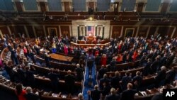 House Speaker Nancy Pelosi administers the oath of office to members of the 117th Congress at the U.S. Capitol, Jan. 3, 2021.