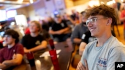 Evan Manni watches the presidential candidates' debate between Republican Donald Trump and Democrat Kamala Harris at Dan's Place in West Greenwich, Rhode Island, Sept. 10, 2024.