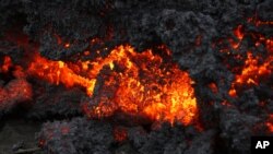 A close up of lava from an eruption on Holuhraun, northwest of the Dyngjujoekull glacier in Iceland, Monday, Sept. 1, 2014. 
