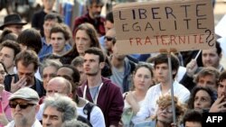 Demonstrators gather in the southwestern town of Toulouse after a young far-left activist was killed during a fight with skinheads in central Paris, June 6, 2013.