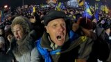 Pro-European Union activists shout as they listen to Ukranian opposition leader Oleh Tyahnybok, during a rally in the Independence Square in Kyiv, Ukraine, Dec. 13, 2013.