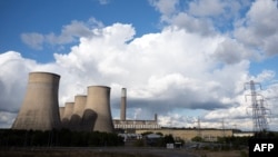 FILE - The Ratcliffe-on-Soar coal-fired power station, which is due to close at the end of the month, is pictured near Nottingham, central England on Sept. 12, 2024. 