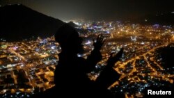 A Muslim pilgrim prays at Mount Al-Noor ahead of the annual haj pilgrimage in Mecca, Oct. 10, 2013.