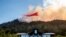 An air tanker drops retardant on the Glass Fire burning above Davis Estates winery in Calistoga, California, Sept. 27, 2020.