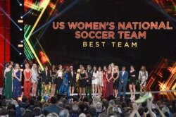The U.S. women's national soccer team accepts the award for best team at the ESPY Awards, July 10, 2019, at the Microsoft Theater in Los Angeles.