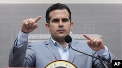 FILE - Puerto Rico Gov. Ricardo Rossello speaks during a press conference in the aftermath of Hurricane Maria, in San Juan, Puerto Rico, Aug. 28, 2018. 