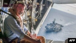 Secretary of Defense Ashton Carter flies in a V-22 Osprey after visiting the aircraft carrier USS Theodore Roosevelt, Nov. 5, 2015. (Dept of Defense Photo)