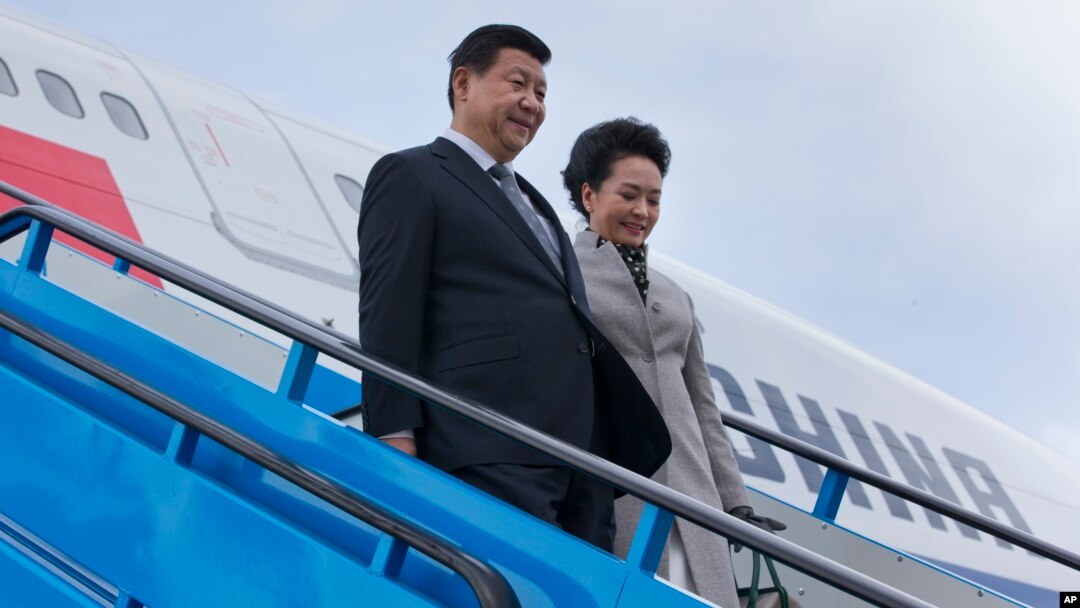 Presiden China Xi Jinping dan isteri tiba di Belanda untuk melakukan lawatan kenegaraan (22/3). 