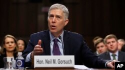 FILE - Supreme Court Justice nominee Neil Gorsuch speaks on Capitol Hill in Washington, March 21, 2017, during his confirmation hearing before the Senate Judiciary Committee. 