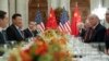 FILE - President Donald Trump and China's President Xi Jinping lead their respective delegatiosn during their bilateral meeting at the G-20 Summit, Dec. 1, 2018, in Buenos Aires, Argentina.