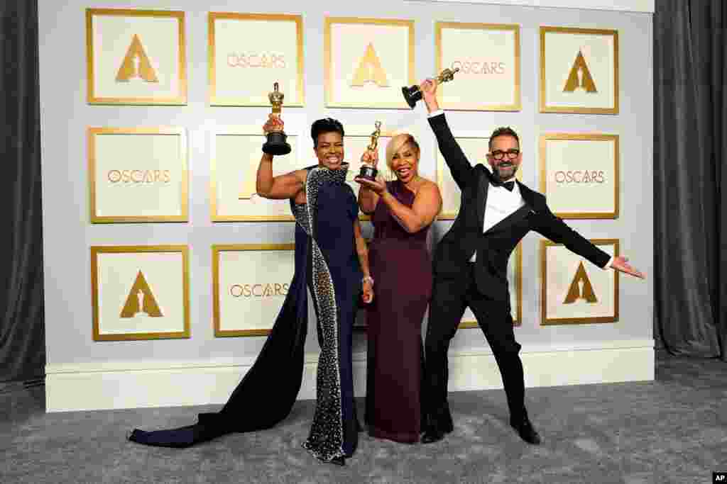 Mia Neal, from left, Jamika Wilson and Sergio Lopez-Rivera, winners of the award for best makeup and hairstyling for &quot;Ma Rainey&#39;s Black Bottom,&quot; pose in the press room at the Oscars on Sunday, April 25, 2021, at Union Station in Los Angeles. (AP…