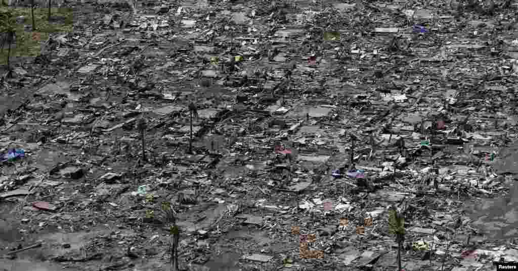 An aerial view of the ruins of houses after the devastation of super Typhoon Haiyan in Tacloban city in central Philippines, Nov. 11, 2013. 