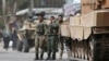 FILE - Turkish soldiers are seen in the center of Afrin, Syria, March 24, 2018.